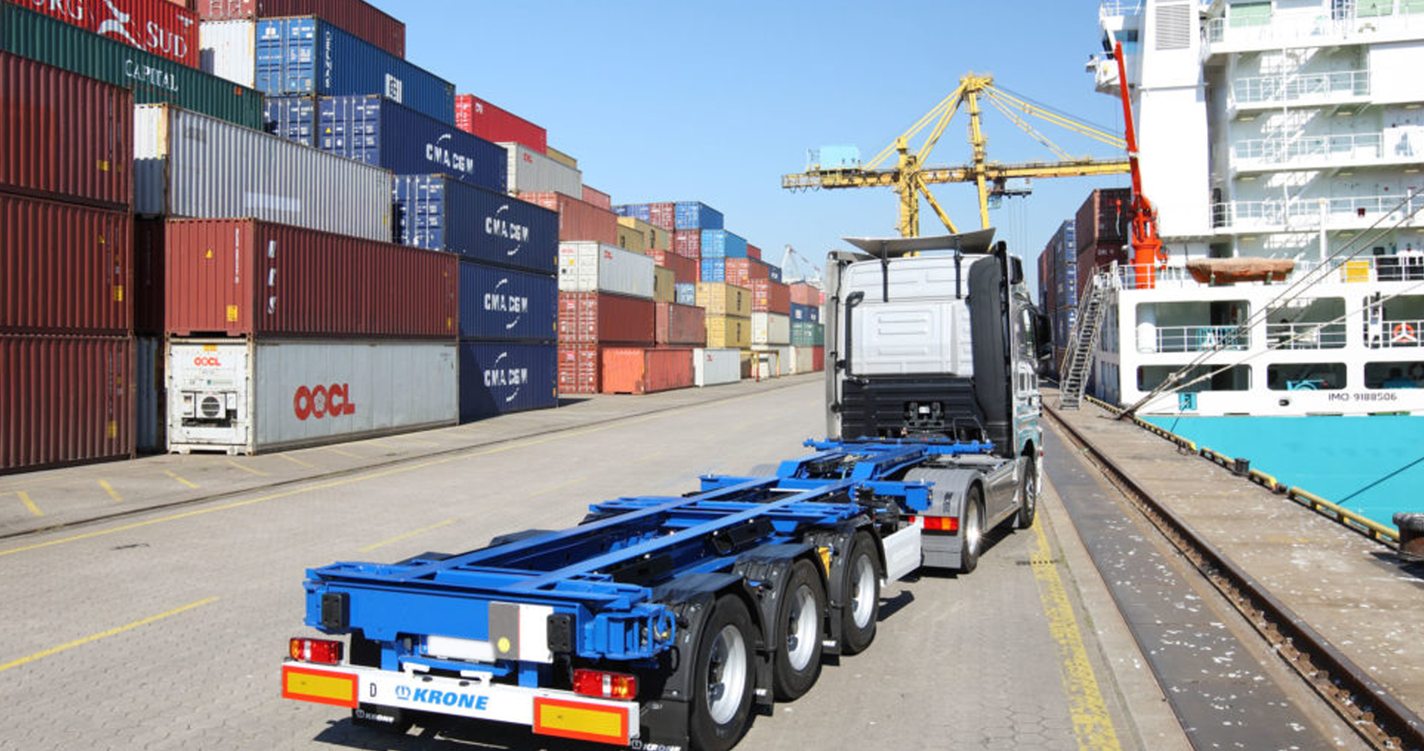 Aerial view of container cargo ship in sea.
