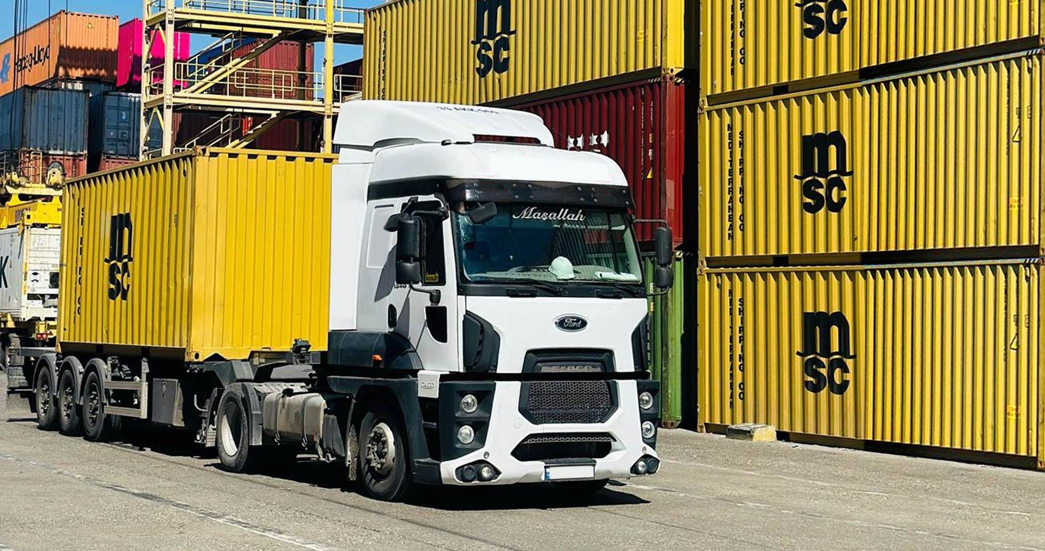 Aerial view of container cargo ship in sea.