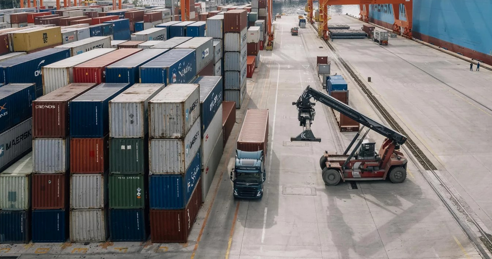 Aerial view of container cargo ship in sea.